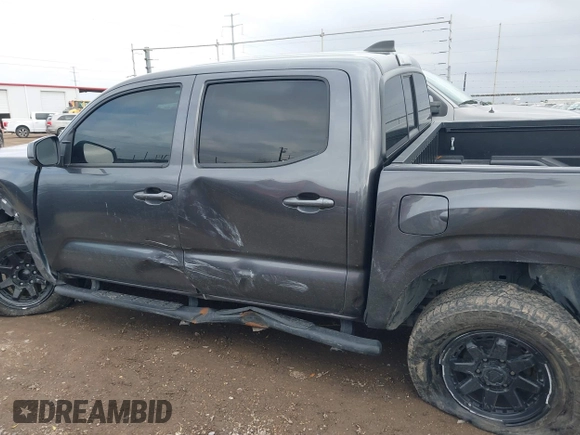 2023 Toyota Tacoma SR with VIN 3TYCZ5AN5PT138770, listed as a IAAI auction lot 41461423 with 19,785 mi miles and . Bid and sale history available at DreamBid. Image 14.