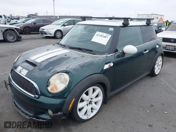 2009 MINI Hardtop S with VIN WMWMF735X9TT94065, listed as a IAAI auction lot 42183487 with 141,746 mi miles and . Bid and sale history available at DreamBid. Image 2.