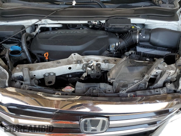 2018 Honda Pilot Touring с VIN 5FNYF6H98JB053524, выставлен на аукционе Copart как лот 61447785 с пробегом 114 942 миль миль и Списание • Salvage title. История ставок и продаж доступна на DreamBid. Изображение 11.