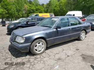 1995 Mercedes-Benz E Class with VIN WDBEA32E7SC246184, listed as a Copart auction lot 52570185 with 122,452 mi miles and Clean Title. Bid and sale history available at carsss.com. Image 1.