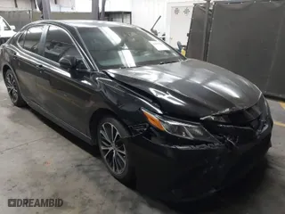 2018 Toyota Camry LE with VIN JTNB11HKXJ3048974, listed as a IAAI auction lot 41879941 with 102,377 mi miles. Bid and sale history available at carsss.com. Image 1.