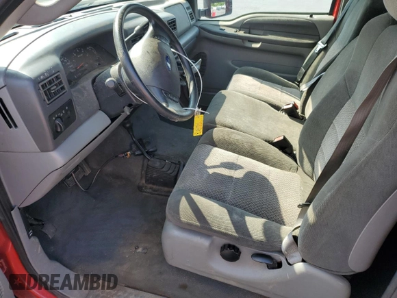 2003 Ford F-250 XL with VIN 1FTNX21L93EA90875, listed as a Copart auction lot 60304115 with 136,956 mi miles and Salvage title. Bid and sale history available at DreamBid. Image 7.