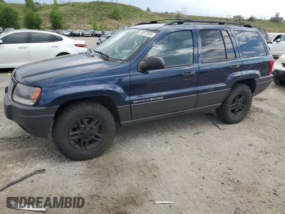 2004 Jeep Grand Cherokee Laredo with VIN 1J4GW48S04C125931, listed as a Copart auction lot 59972695 with 198,403 mi miles and Salvage title. Bid and sale history available at DreamBid. Image 1.