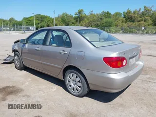 2003 Toyota Corolla CE with VIN 2T1BR32E53C015709, listed as a IAAI auction lot 42057744 with 120,022 mi miles and . Bid and sale history available at DreamBid. Image 3.