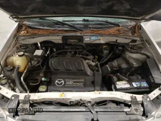 2003 Mazda Tribute ES with VIN 4F2CZ96173KM04753, listed as a Copart auction lot 76811034 with 96,351 mi miles and Clean Title. Bid and sale history available at carsss.com. Image 12.