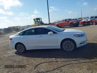 2017 Ford Fusion Titanium with VIN 3FA6P0K92HR362317, listed as a IAAI auction lot 41741671 with 146,989 mi miles. Bid and sale history available at carsss.com. Image 13.