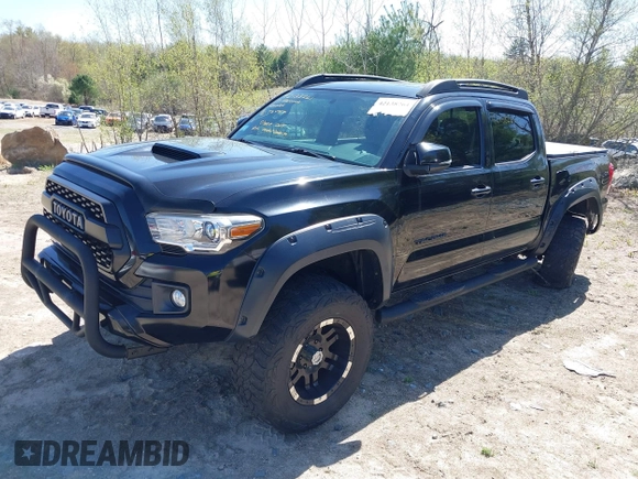 2017 Toyota Tacoma SR5 z VIN 3TMCZ5AN1HM062459, wystawiony jako IAAI lot #42138261 z przebiegiem 75 474 mil mil oraz . Historia ofert i sprzedaży dostępna na DreamBid. Obrazek 2.