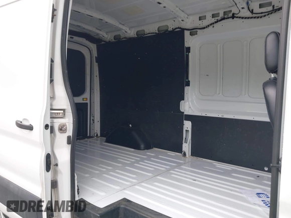 2022 Ford Transit Cargo with VIN 1FTBR1C85NKA74578, listed as a IAAI auction lot 42316744 with 63,376 mi miles and . Bid and sale history available at DreamBid. Image 8.