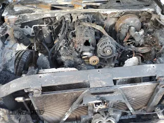 2003 Cadillac Escalade z VIN 1GYEC63T83R133508, wystawiony jako Copart lot #80091524 z przebiegiem Nie podano mil oraz Szkoda całkowita • Salvage title. Historia ofert i sprzedaży dostępna na DreamBid. Obrazek 12.