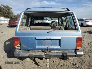 1991 Jeep Cherokee with VIN 1J4FJ58S1ML520376, listed as a Copart auction lot 75452364 with 147,982 mi miles and Salvage title. Bid and sale history available at DreamBid. Image 6.