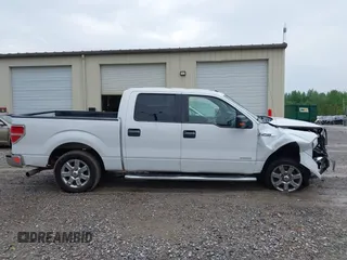 2014 Ford F-150 XL with VIN 1FTFW1CT0EKF51223, listed as a IAAI auction lot 42117076 with 176,505 mi miles. Bid and sale history available at carsss.com. Image 13.