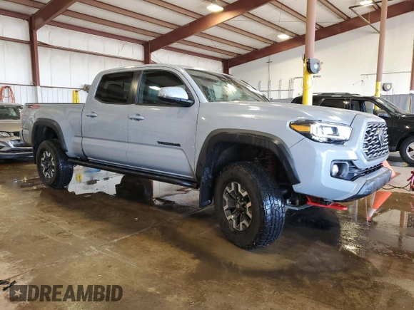 2020 Toyota Tacoma SR5 with VIN 3TMDZ5BN0LM091107, listed as a Copart auction lot 57582235 with 39,331 mi miles and Salvage title. Bid and sale history available at DreamBid. Image 4.