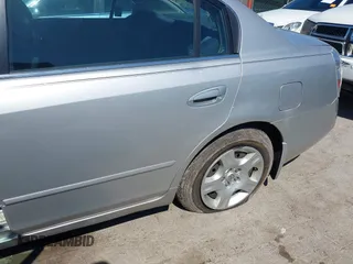 2004 Nissan Altima S with VIN 1N4AL11D84C171897, listed as a IAAI auction lot 41922715 with 101,865 mi miles. Bid and sale history available at carsss.com. Image 6.