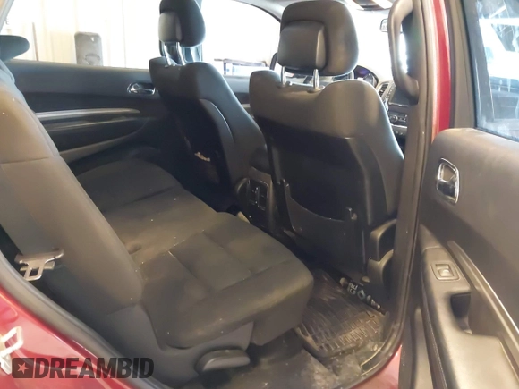 2013 Dodge Durango SXT with VIN 1C4RDJAG4DC527945, listed as a IAAI auction lot 41590545 with 141,074 mi miles and . Bid and sale history available at DreamBid. Image 8.