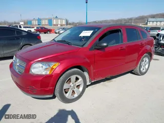2010 Dodge Caliber SXT with VIN 1B3CB4HA1AD664203, listed as a IAAI auction lot 41692309 with 249,812 mi miles. Bid and sale history available at carsss.com. Image 2.