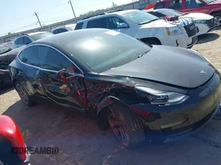 2020 Tesla Model 3 Long Range z VIN 5YJ3E1EB3LF622290, wystawiony jako IAAI lot #41978398 z przebiegiem 59 127 mil mil oraz . Historia ofert i sprzedaży dostępna na DreamBid. Obrazek 12.