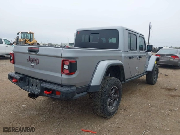 2021 Jeep Gladiator Rubicon with VIN 1C6JJTBG1ML525920, listed as a IAAI auction lot 41548657 with 22,574 mi miles. Bid and sale history available at carsss.com. Image 4.