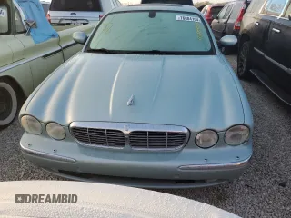 2005 Jaguar XJ with VIN SAJWA79C05SG37189, listed as a Copart auction lot 76804104 with 0 mi miles and Salvage Title. Bid and sale history available at carsss.com. Image 5.