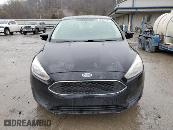 2017 Ford Focus SE with VIN 1FADP3F2XHL316724, listed as a Copart auction lot 52321155 with 137,005 mi miles and Salvage Title. Bid and sale history available at DreamBid. Image 5.