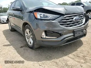 2020 Ford Edge SEL с VIN 2FMPK3J92LBA30123, выставлен на аукционе Copart как лот 63192805 с пробегом 119 534 миль миль и Списание • Salvage title. История ставок и продаж доступна на DreamBid. Изображение 13.