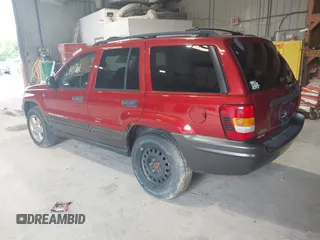 2004 Jeep Grand Cherokee Laredo with VIN 1J4GW48S74C420234, listed as a IAAI auction lot 41741031 with 191,862 mi miles and . Bid and sale history available at DreamBid. Image 3.