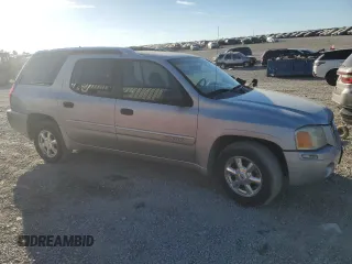 2004 GMC Envoy SLE with VIN 1GKET12S846184810, listed as a Copart auction lot 77475994 with Not Provided miles and Clean Title. Bid and sale history available at DreamBid. Image 4.
