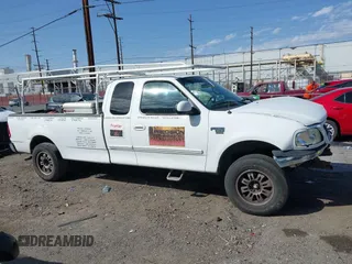 2002 Ford F-150 XL with VIN 1FTRX17L82NA54581, listed as a IAAI auction lot 41698662 with 220,321 mi miles. Bid and sale history available at carsss.com. Image 13.