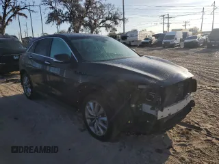 2022 Infiniti QX50 Pure with VIN 3PCAJ5AB2NF117098, listed as a Copart auction lot 83414574 with 30,779 mi miles and Salvage title. Bid and sale history available at DreamBid. Image 4.