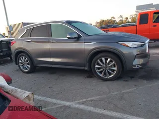 2021 Infiniti QX50 Luxe with VIN 3PCAJ5BA9MF124179, listed as a IAAI auction lot 42296244 with 79,935 mi miles and . Bid and sale history available at DreamBid. Image 13.