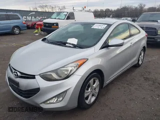 2013 Hyundai Elantra Coupe SE with VIN KMHDH6AE8DU011104, listed as a IAAI auction lot 41588963 with 112,726 mi miles. Bid and sale history available at carsss.com. Image 6.