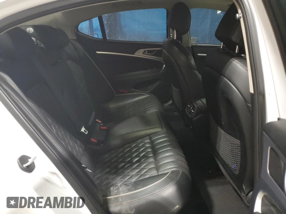2021 Genesis G70 2.0T with VIN KMTG44LAXMU070314, listed as a Copart auction lot 88990385 with 52,517 mi miles and Salvage title. Bid and sale history available at DreamBid. Image 10.