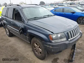 2004 Jeep Grand Cherokee Laredo with VIN 1J4GX48S64C291075, listed as a IAAI auction lot 41805747 with 282,384 mi miles. Bid and sale history available at carsss.com. Image 1.