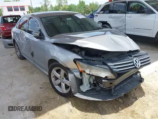 2014 Volkswagen Passat SE with VIN 1VWBP7A36EC007205, listed as a IAAI auction lot 42456453 with 181,902 mi miles and . Bid and sale history available at DreamBid. Image 1.