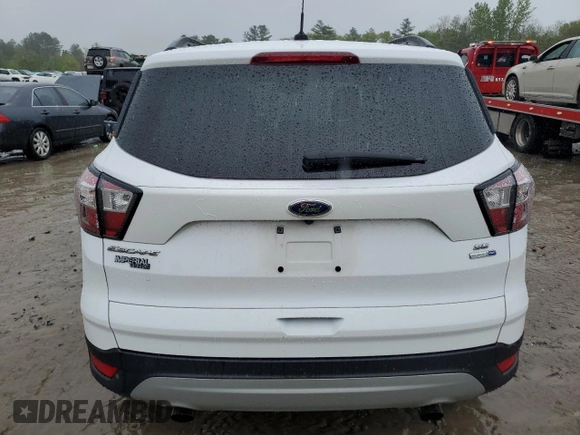 2018 Ford Escape SE z VIN 1FMCU9GD2JUA76985, wystawiony jako Copart lot #55743855 z przebiegiem 84 549 mil mil oraz Szkody całkowita. Historia ofert i sprzedaży dostępna na DreamBid. Obrazek 6.