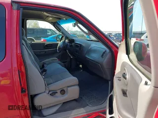 2003 Ford F-150 XL with VIN 2FTRX18L13CA49907, listed as a IAAI auction lot 41888674 with 132,944 mi miles. Bid and sale history available at carsss.com. Image 5.
