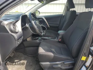 2018 Toyota RAV4 XLE with VIN JTMRFREV2JJ215776, listed as a Copart auction lot 51745205 with 52,009 mi miles and Salvage Title. Bid and sale history available at DreamBid. Image 7.