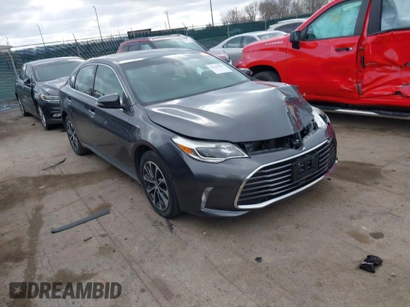 2018 Toyota Avalon XLE with VIN 4T1BK1EB9JU275097, listed as a IAAI auction lot 41940585 with 119,854 mi miles and . Bid and sale history available at DreamBid. Image 1.