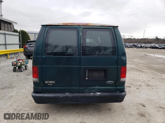 1999 Ford Econoline Cargo with VIN 1FTRE1424XHB64812, listed as a Copart auction lot 85494344 with 197,032 mi miles and Non Repairable. Bid and sale history available at carsss.com. Image 6.
