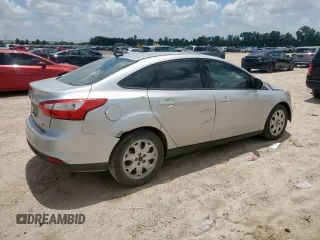 2012 Ford Focus SE with VIN 1FAHP3F29CL287498, listed as a Copart auction lot 61476855 with 139,801 mi miles and Salvage title. Bid and sale history available at DreamBid. Image 3.