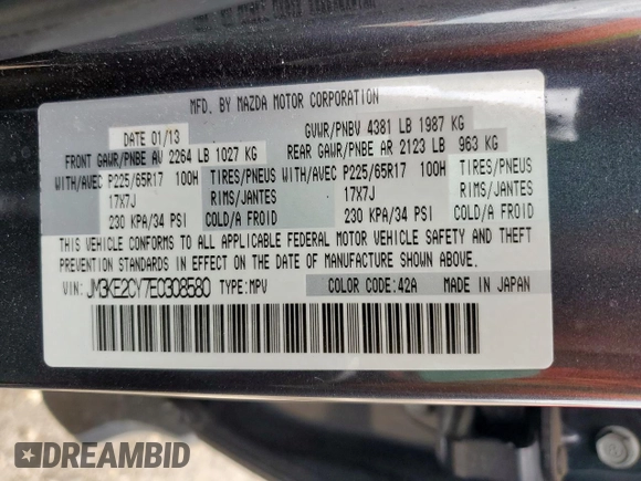2014 Mazda CX-5 Touring z VIN JM3KE2CY7E0308580, wystawiony jako Copart lot #60565835 z przebiegiem 92 708 mil mil oraz Szkoda całkowita • Salvage title. Historia ofert i sprzedaży dostępna na DreamBid. Obrazek 13.