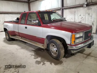 1991 GMC Sierra 1500 with VIN 2GTHC39K2M1538208, listed as a Copart auction lot 41664305 with 56,293 mi miles and Salvage Title. Bid and sale history available at DreamBid. Image 4.