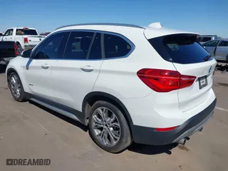 2017 BMW X1 xDrive28i with VIN WBXHT3C30H5F68187, listed as a IAAI auction lot 41830892 with 101,313 mi miles. Bid and sale history available at carsss.com. Image 3.