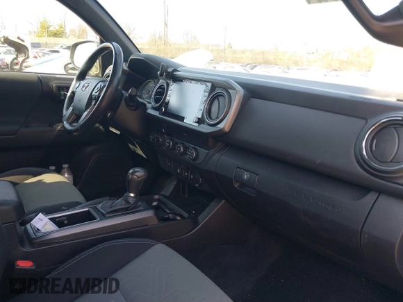 2020 Toyota Tacoma SR5 with VIN 3TMCZ5AN3LM320411, listed as a IAAI auction lot 41838498 with 50,252 mi miles and . Bid and sale history available at DreamBid. Image 5.