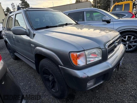 2004 Nissan Pathfinder SE with VIN JN8DR09Y64W905091, listed as a Copart auction lot 57692615 with 238,457 mi miles and Clean title. Bid and sale history available at DreamBid. Image 1.