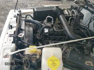 1999 Jeep Wrangler Sport z VIN 1J4FY19S1XP413327, wystawiony jako IAAI lot #43320976 z przebiegiem 90 849 mil mil oraz . Historia ofert i sprzedaży dostępna na DreamBid. Obrazek 13.