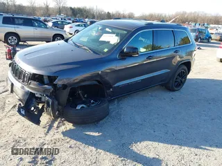 2021 Jeep Grand Cherokee 80th Anniversary z VIN 1C4RJFBG5MC737412, wystawiony jako IAAI lot #41753550 z przebiegiem 54 921 mil mil oraz . Historia ofert i sprzedaży dostępna na DreamBid. Obrazek 2.