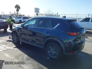 2019 Mazda CX-5 Touring with VIN JM3KFACM7K1534905, listed as a IAAI auction lot 41945607 with 56,014 mi miles. Bid and sale history available at carsss.com. Image 3.