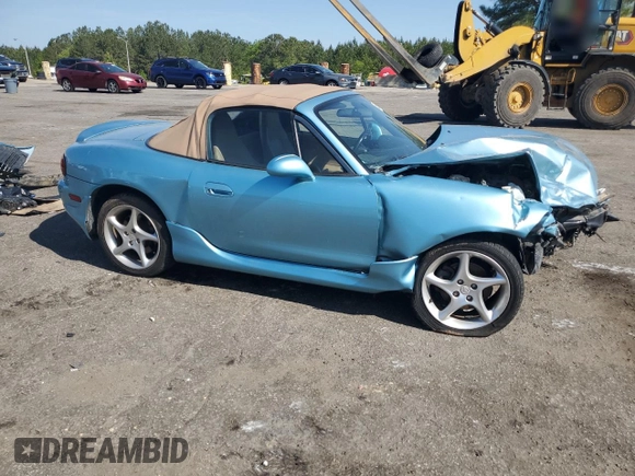 2001 Mazda MX-5 Miata z VIN JM1NB353910216600, wystawiony jako Copart lot #50916465 z przebiegiem Nie podano mil oraz Szkoda całkowita • Salvage title. Historia ofert i sprzedaży dostępna na DreamBid. Obrazek 4.