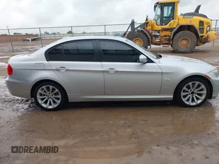 2011 BMW 3 Series 328i with VIN WBAPH7C57BA801980, listed as a IAAI auction lot 42100423 with 130,048 mi miles and . Bid and sale history available at DreamBid. Image 13.