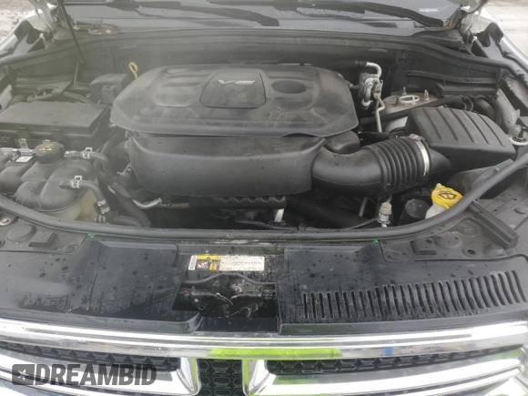 2017 Dodge Durango SXT z VIN 1C4RDJAG3HC661321, wystawiony jako Copart lot #56484865 z przebiegiem 196 047 mil mil oraz Szkoda całkowita • Salvage title. Historia ofert i sprzedaży dostępna na DreamBid. Obrazek 12.